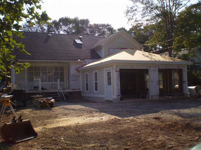 House with a front extension under construction.