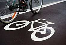 Image of a bike riding on a painted bike lane
