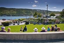 Residents watching performance at Harbourside Park