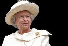 picture of Queen Elizabeth II wearing white suit and hat