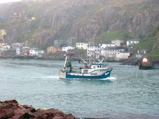 Fishing trawler leaving port