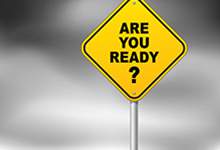 A yellow sign with black text reads 'Are You Ready?"
