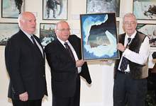 Chris Collingwood, Councillor Tom Hann and Lieutenant Governor John Crosbie at artwork donation to Home From the Sea