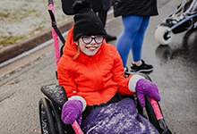 child using a hippocampe all-terrain wheelchair
