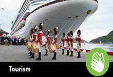 Photo of cruise boat with the words Tourism