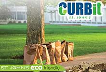 stock photo of paper yard waste bags at the curb with Curb It logo in the image